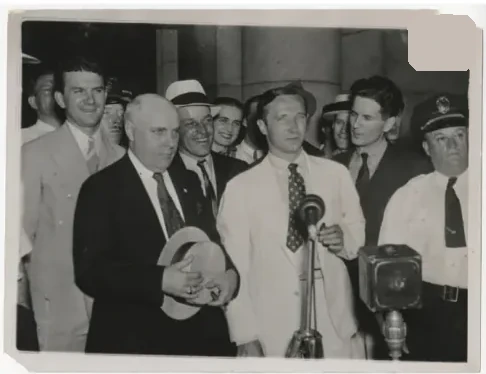Archive plate captioned Marion A. Zioncheck speaking at a microphone, June 30, 1936